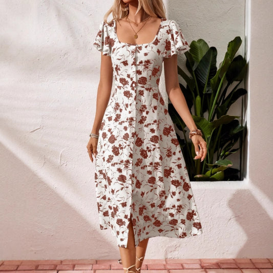 Robe bohème imprimé floral bleu et blanc, style chic estival pour femme.