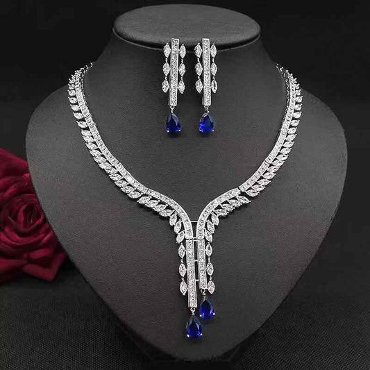 Ensemble collier zircon goutte & boucles fleurs