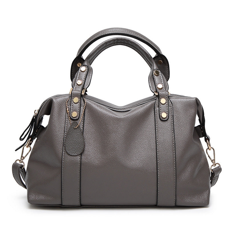 Sac Boston – Design Rétro avec Rivets