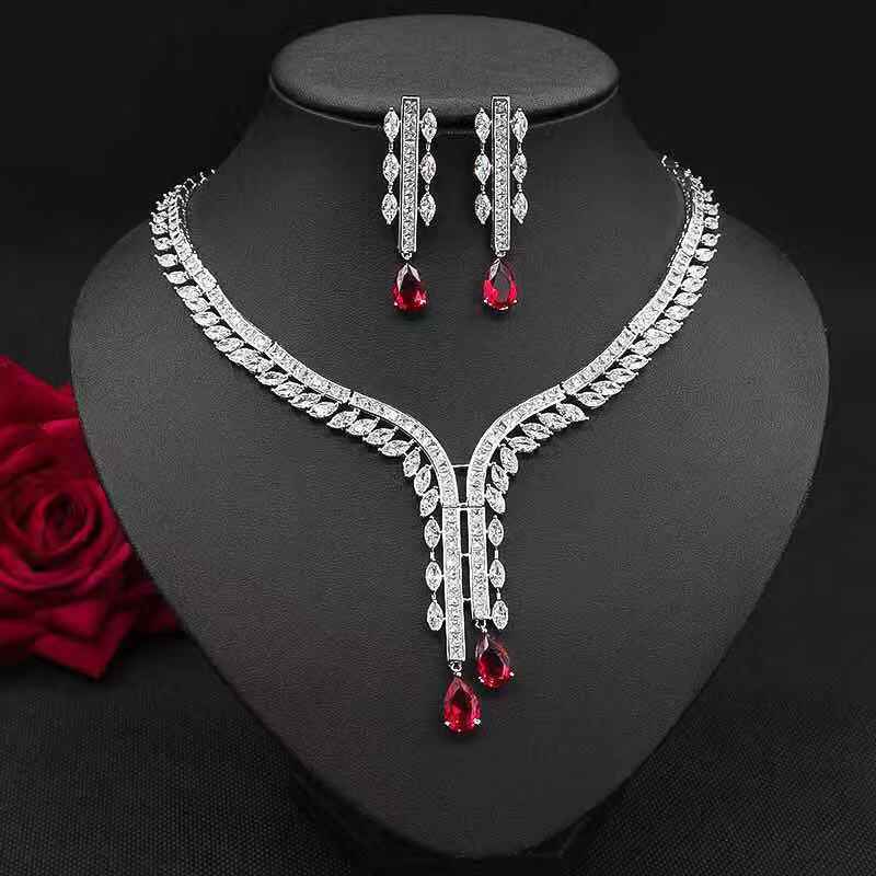 Ensemble collier zircon goutte & boucles fleurs