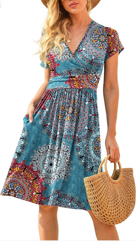 Robe fluide femme été, manches courtes et style raffiné.